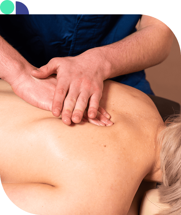 Group 1321316007 Person receiving a back massage therapy session.
